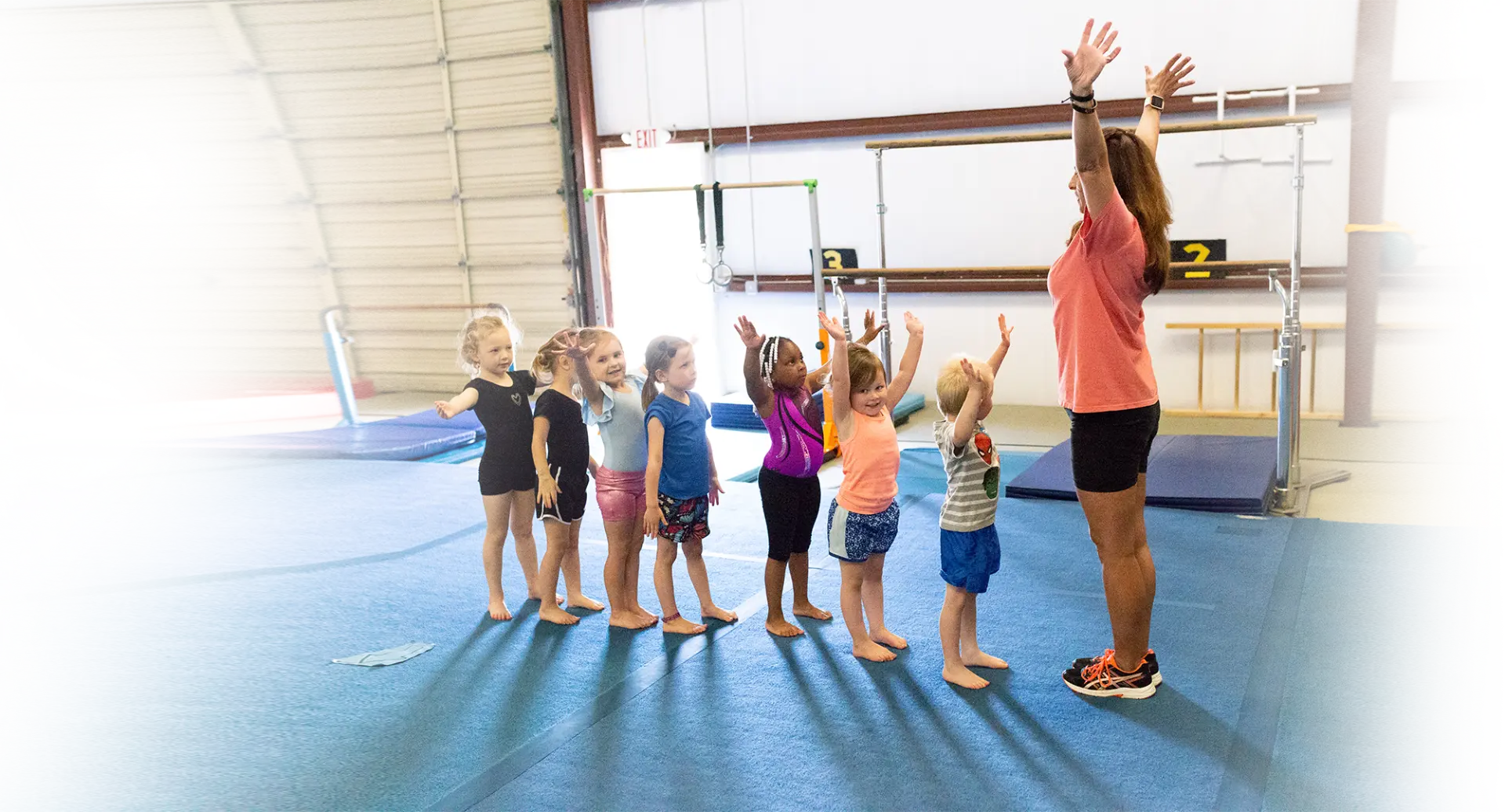 Preschool gymnasts with their coach at Miss Libby's