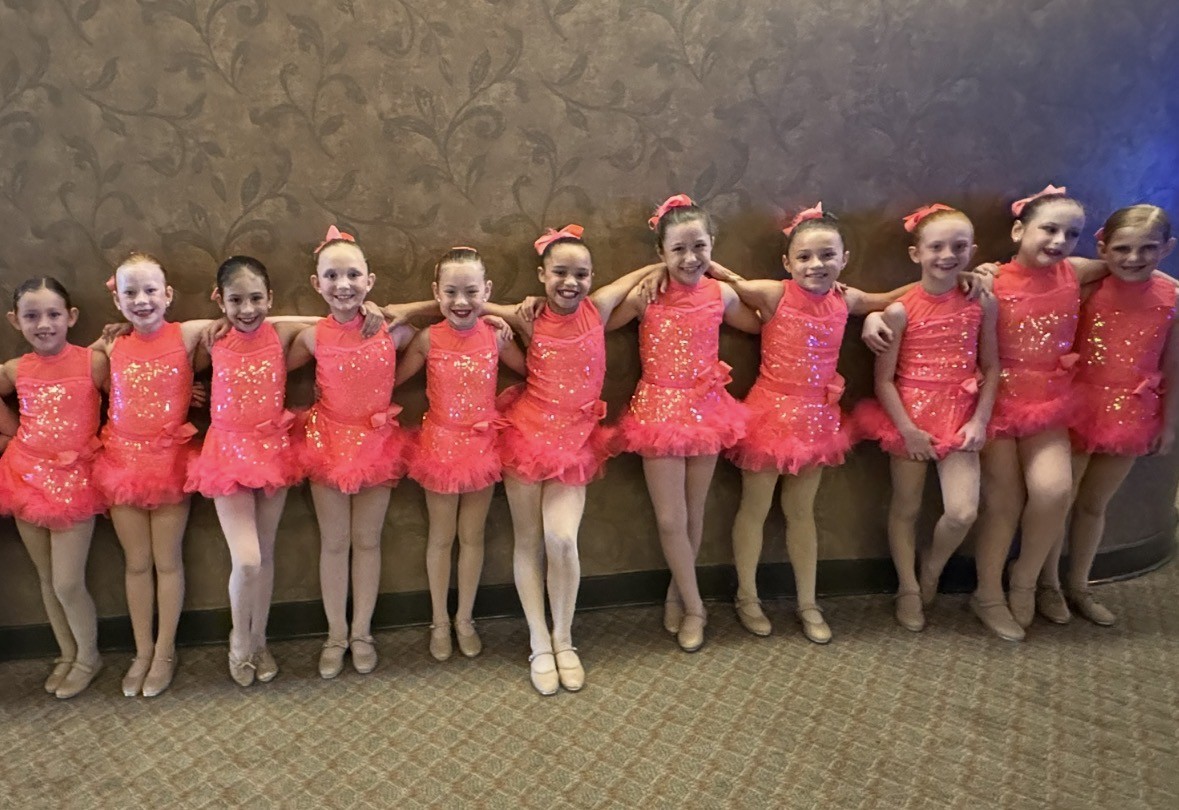 Young dancers in pink costumes at Miss Libby's
