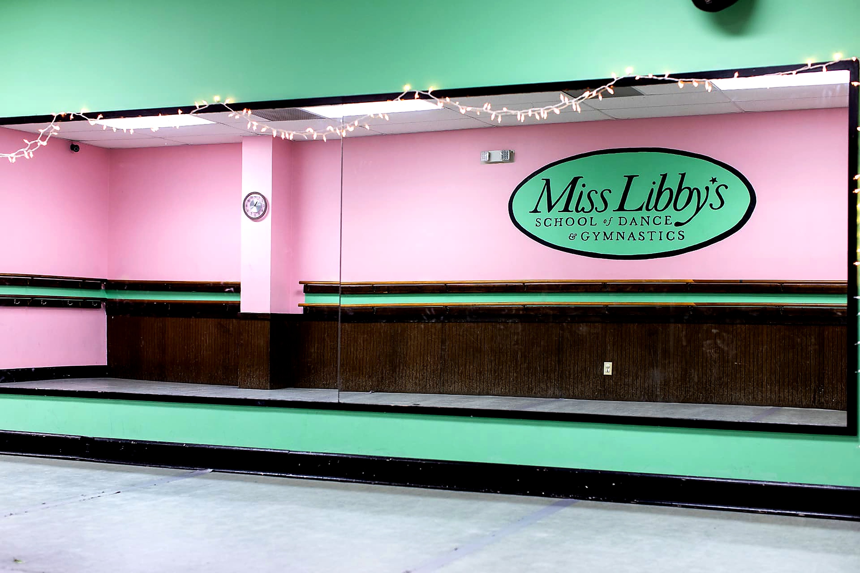 Mint and pink studio with double barres and the Miss Libby's oval logo